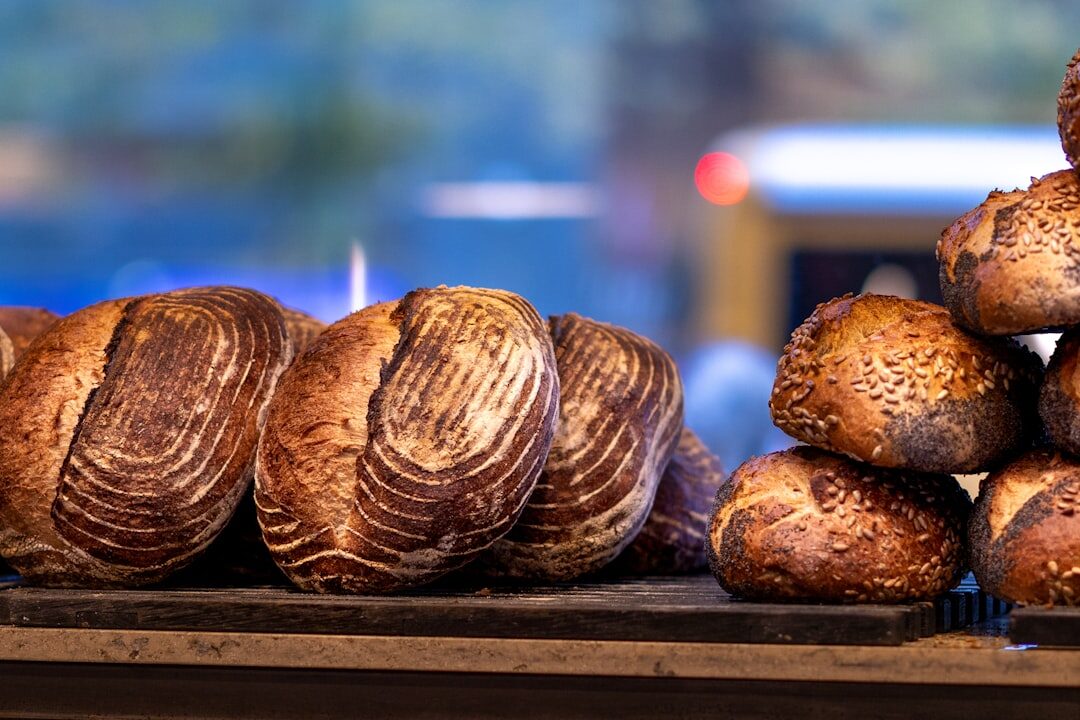 Freshly baked rye bread on a wooden table in a Danish bakery