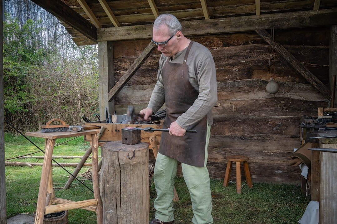 blacksmith at forge