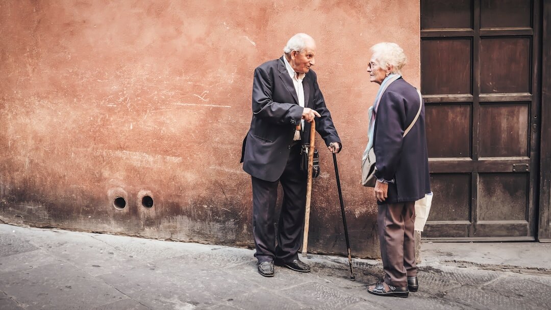 elderly men sharing stories