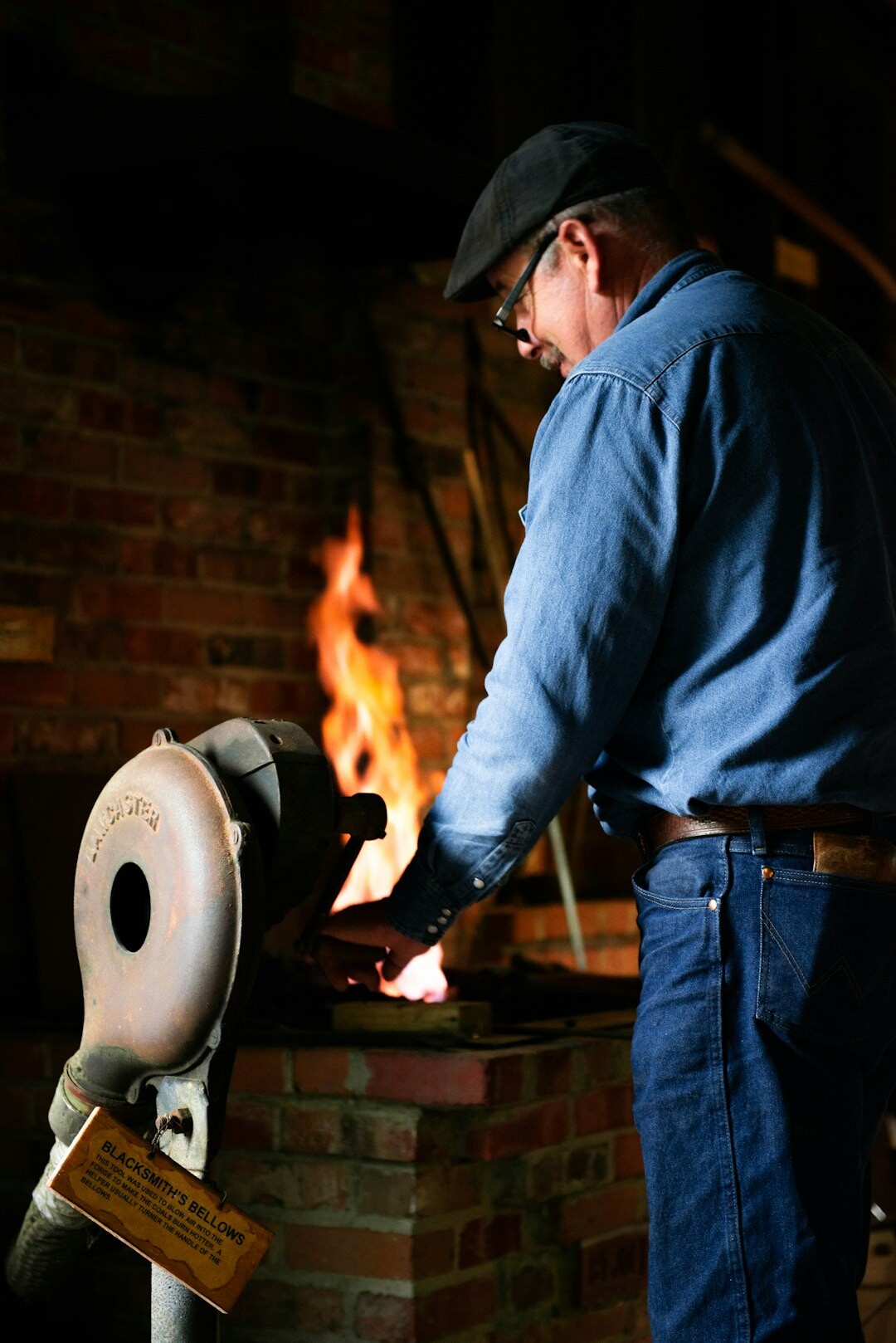 blacksmith at forge
