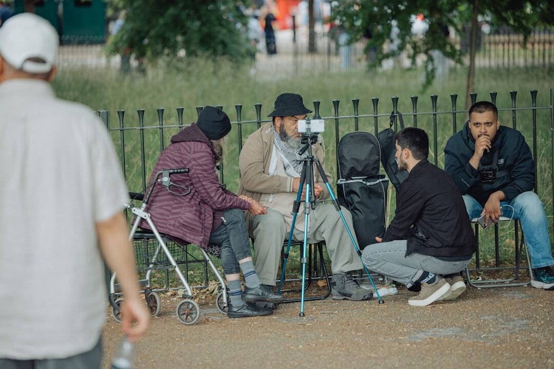documentary photographer interviewing elder