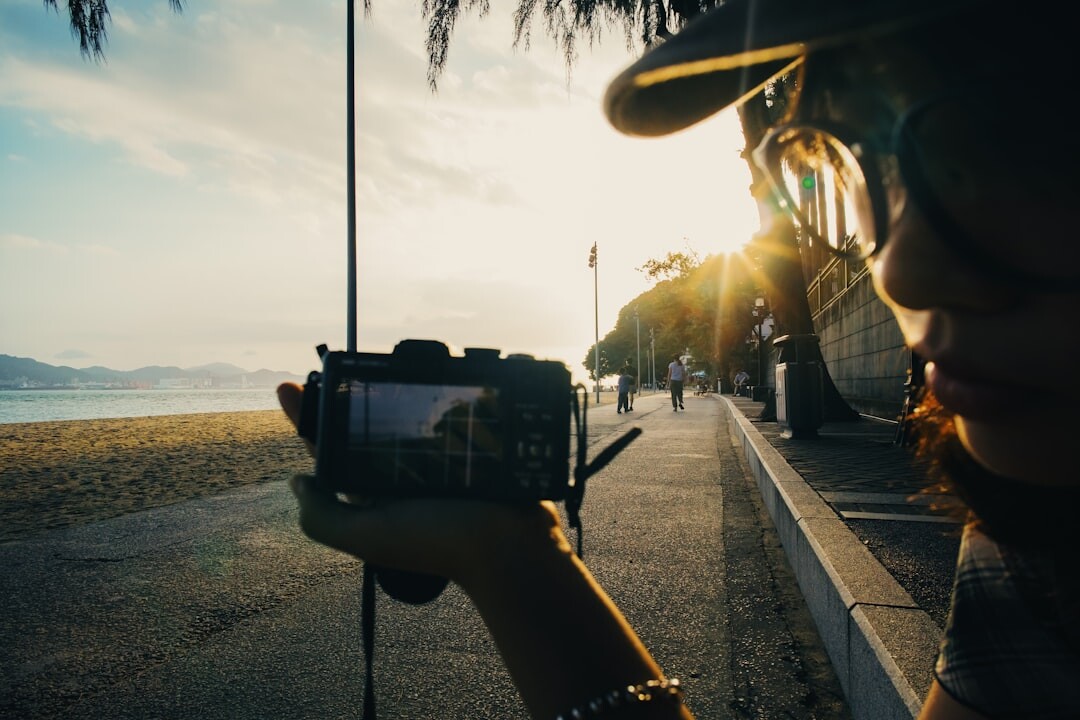 woman taking photos outdoors
