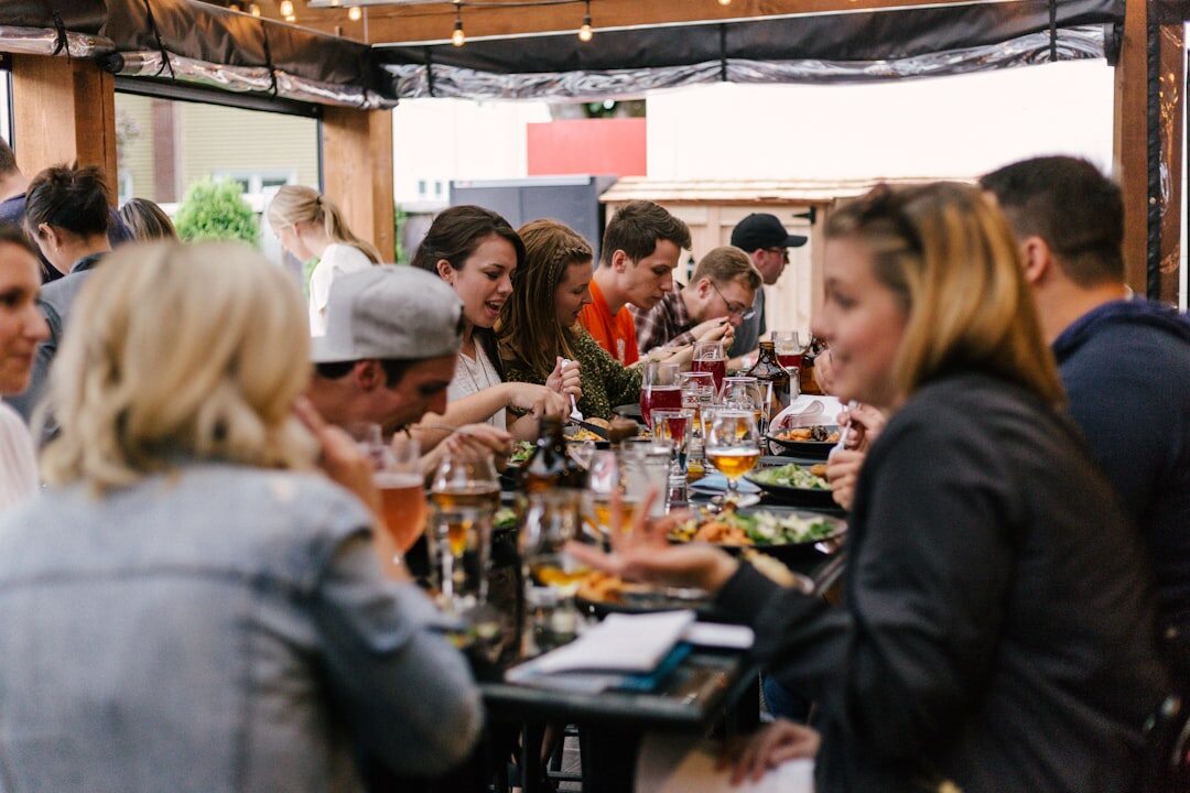 people sharing meal